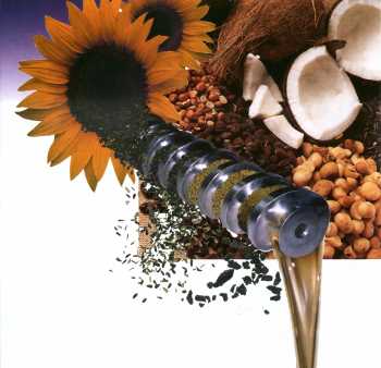 Oil Expelling demonstration. Coconut and Sunflower seed oil pressed.